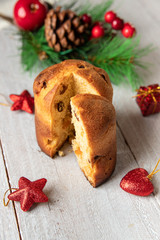 Traditional Christmas panettone with dried fruits and orange zest