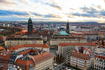 Panoramic view of Dresden city with old buildings at sunset from church of Our Lady Frauenkirche, Germany. November 2019