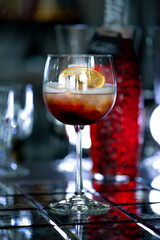 Sbagliato cocktail at bar counter in night club or restaurant. Close-up.