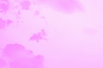 Light soft pink sky background. Beautiful romantic sky with pink magenta clouds