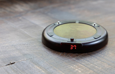 Queue Paging Wireless Calling System on wooden table. managenet customer for self service in restaurant or coffee shop.