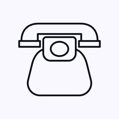 Tiny old telephone icon isolated on white background