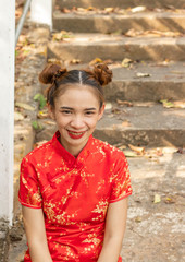 Asian women wearing chinese red dress.