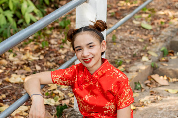 Asian women wearing chinese red dress.