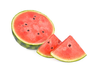 sliced and half cut ripe watermelon with seeds on white background