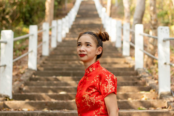 Asian women wearing chinese red dress.