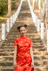 Asian women wearing chinese red dress.