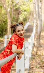 Asian women wearing chinese red dress.