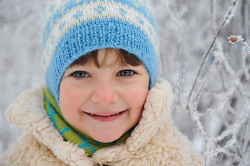 a girl with blush on her cheeks in winter