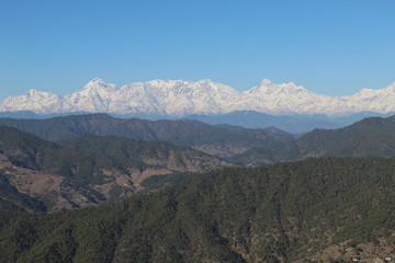 Green Hills along with Snow Mountains