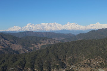 Green Hills along with Snow Mountains