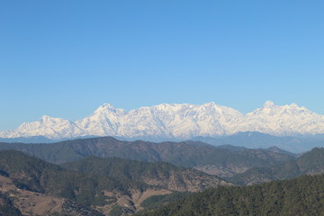 Green Hills along with Snow Mountains