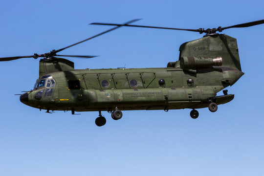VOLKEL, THE NETHERLANDS - JUN 15, 2013: Royal Netherlands Air Force Boeing CH-47D Chinook transport helicopter in flight.
