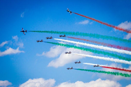 VOLKEL, THE NETHERLANDS - JUN 15, 2013: The Italian aerobatic demonstration team Frecce Tricolori performing with their MB339 jet aircraft at the Dutch Air Force Open Day airshow.