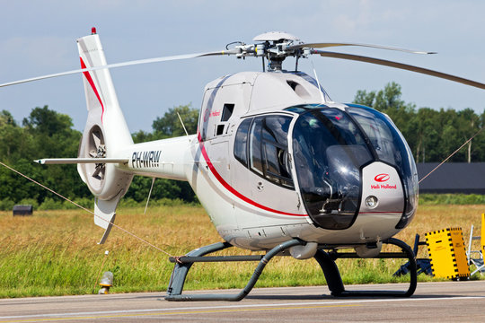 VOLKEL, NETHERLANDS - JUN 14 ,2013: urocopter EC120B Colibri from HeliHolland on the tarmac of Volkel airbase.