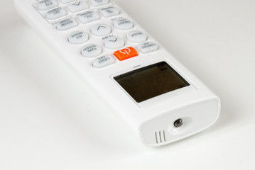 air conditioning remote control, white plastic cover with colored button and white buttons, for...