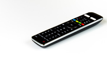 TV remote control, black plastic cover with colored buttons and white buttons, on and off, remote control, remote control, home range, home furnishings