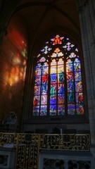 Fototapeta na wymiar Prague Visit Tourist, St. Saint Vitus Cathedral inside stained glass, Czech Republic