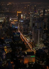 Obraz na płótnie Canvas panoramic skyline of Bangkok by night from King Power Mahanakhon, Bangkok, Thailand