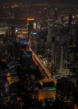 panoramic skyline of Bangkok by night from King Power Mahanakhon, Bangkok, Thailand © Cesare Palma