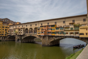 Fototapeta na wymiar Arno river and Ponte Vecchio bridge, Florence, Italy