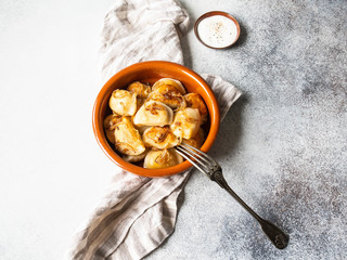 Traditional Polish dish - pierogi or dumplings or vareniki potatoes and mushrooms