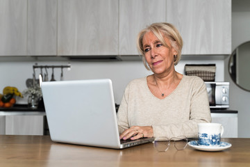 Adult woman in career working at home