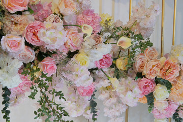 rose flower decoration on wedding backdrop of design wall background