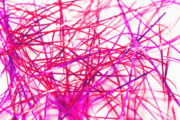 Colorful serpentine close up on white background. Abstract festive and party concept backdrop