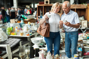 Pensioner family buys vintage dishes at a flea market