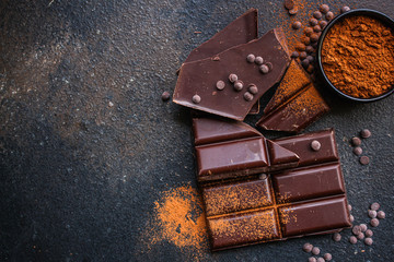chocolate (delicious cocoa dessert, pieces ofbackground. top view. copy space sweets) menu concept....