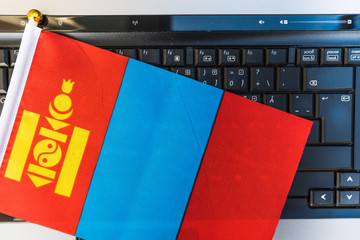 flag of Mongolia on computer, laptop keyboard