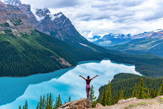 Woman enjoying the view of Peyto Lake, Alberta, Canada
