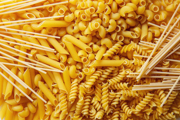 Top view Heap of various uncooked pasta