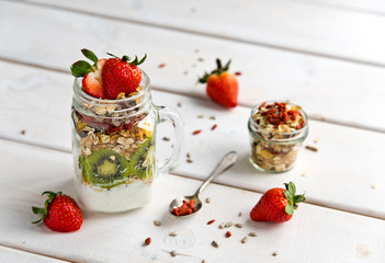 Dessert withl with berries and antique spoon on a retro background on a retro background
