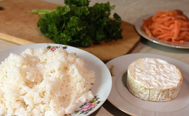 Food composition, boiled rice, parsley, red fish and cheese