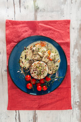 risotto with fresh cream, salted chicken, rehydrated ceps and mushrooms