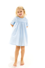 Fototapeta premium Little girl in an elegant dress.The concept of a happy childhood