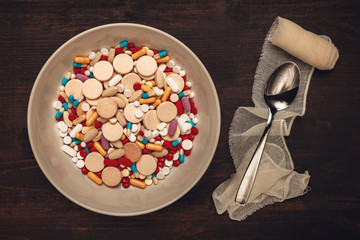Plate full of tablets, pills and capsule medication