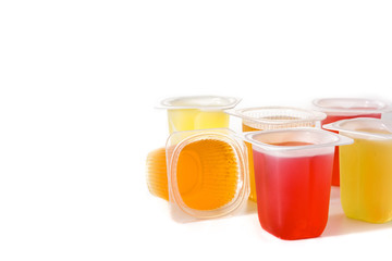 jellies of different flavors and colors isolated on white background. Copy space