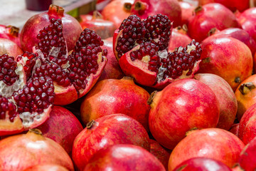 Cut and whole pomegranate fruit whole and chopped pomegranate