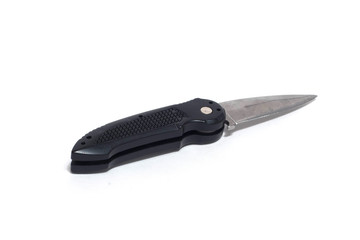 black folding knife on a white background