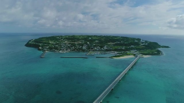 「ドローン空撮」沖縄今帰仁村の人気観光地、古宇利島にかかる古宇利大橋-"Drone aerial photography" Kouri Ohashi Bridge over Kouri Island, a popular tourist destination of Okinawa Nakijin Village