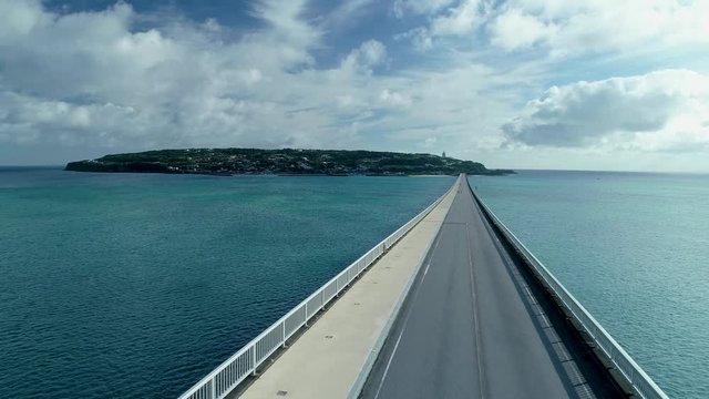 「ドローン空撮」沖縄今帰仁村の人気観光地、古宇利島にかかる古宇利大橋-"Drone aerial photography" Kouri Ohashi Bridge over Kouri Island, a popular tourist destination of Okinawa Nakijin Village