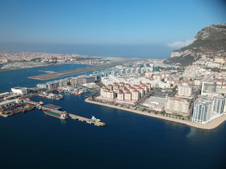 Aerial view on the Gibraltar city harbor at summer sun light