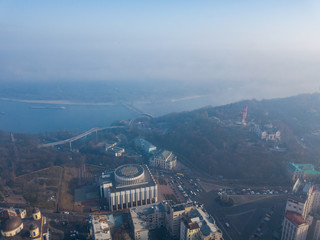 Aerial drone view. Panoramic view of the Dnieper River from the center of Kiev on a foggy morning.