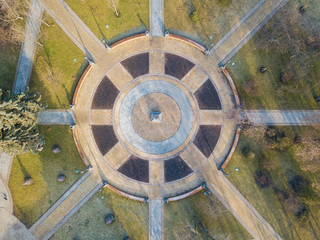 Aerial drone view. Park alleys in the form of a circle.