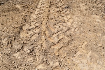 lots tire track on soil for background