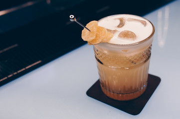Sweet Famous white with caramels decoration fruit  Author inspired Cocktail Bar Drink on bar...