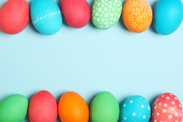 Easter eggs on the table top view. Easter composition with a place to insert text.